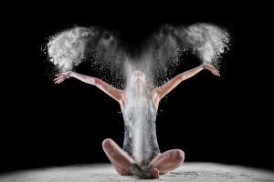 Dancer making dust trail that looks like wings